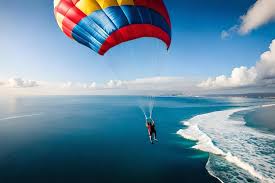 Adam Cherrington parasailing