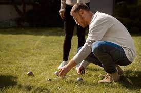 Adam Cherrington playing Bocce Ball